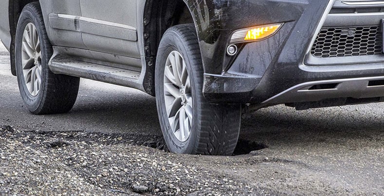 POTHOLES AND CURBS Damage Tyre
