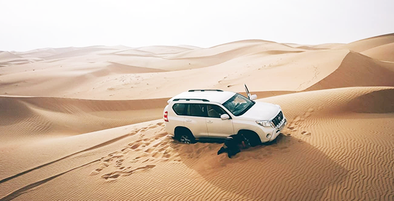 Car Bogged in Sand